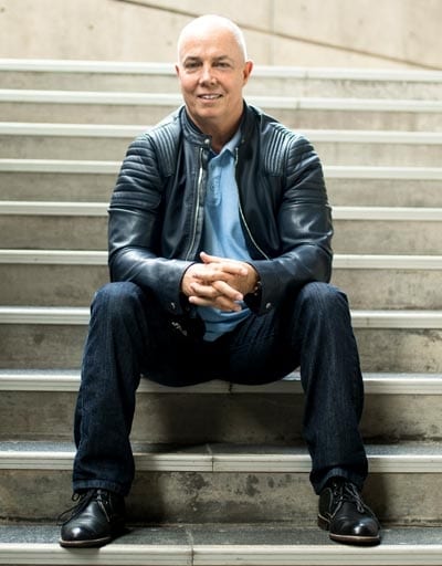 Gene McGuire sitting on steps
